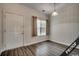 Light and airy entryway with wood-look floors and window at 4220 Coquina Harbour Dr. # B-11, Little River, SC 29566