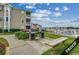 Community grilling area with marina view at 4220 Coquina Harbour Dr. # B-11, Little River, SC 29566