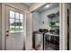 Convenient laundry room with washer, dryer, and exterior access at 829 44Th Ave. N, Myrtle Beach, SC 29577