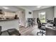 Modern kitchenette with breakfast bar and view into the living area at 829 44Th Ave. N, Myrtle Beach, SC 29577