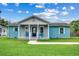 Charming light blue house with gray brick accents at 829 44Th Ave. N, Myrtle Beach, SC 29577