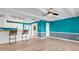 Open concept living and kitchen with teal walls at 519 31St Ave. N # 7, Myrtle Beach, SC 29577