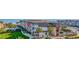 Oceanfront property, featuring a two-story building with balconies and lush landscaping at 5601 N Ocean Blvd. # C-202, Myrtle Beach, SC 29577