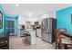 Modern kitchen with stainless steel appliances, granite countertops, and white cabinets at 5601 N Ocean Blvd. # C-202, Myrtle Beach, SC 29577