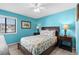 Bright bedroom with a double bed and ocean-themed decor at 5601 N Ocean Blvd. # C-202, Myrtle Beach, SC 29577