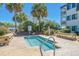 Community hot tub with benches and palm trees at 5601 N Ocean Blvd. # C-202, Myrtle Beach, SC 29577