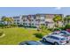 Aerial view showcasing the building's exterior and surrounding landscape at 5601 N Ocean Blvd. # C-202, Myrtle Beach, SC 29577