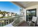 Relaxing balcony with ocean view and comfortable rocking chairs at 5601 N Ocean Blvd. # C-202, Myrtle Beach, SC 29577