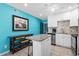 Well-equipped kitchen featuring granite countertops, stainless steel appliances, and white cabinetry at 5601 N Ocean Blvd. # C-202, Myrtle Beach, SC 29577