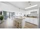 Kitchen with island, granite counters, and white cabinets at 201 74Th Ave. N # 2749/50, Myrtle Beach, SC 29572