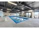 Indoor heated swimming pool with large windows offering ocean views at 201 74Th Ave. N # 2749/50, Myrtle Beach, SC 29572