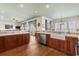 Open kitchen with island, hardwood floors, and ocean views at 132 N Waccamaw Dr., Murrells Inlet, SC 29576