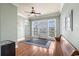 Bright common area with hardwood floors and access to an ocean view balcony at 132 N Waccamaw Dr., Murrells Inlet, SC 29576