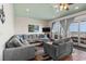 Spacious living room with ocean view, hardwood floors, and comfy furniture at 132 N Waccamaw Dr., Murrells Inlet, SC 29576