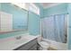 Bathroom with shower/tub combo, toilet and vanity with single sink at 132 N Waccamaw Dr., Murrells Inlet, SC 29576
