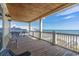 Spacious oceanfront deck with seating and stunning water views at 132 N Waccamaw Dr., Murrells Inlet, SC 29576