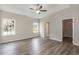 Main bedroom with walk-in closet and wood-look floors at 612 Woodside Dr., Conway, SC 29526