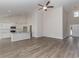 Open kitchen with island, stainless steel appliances, and white cabinets at 612 Woodside Dr., Conway, SC 29526