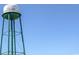Tall green water tower against blue sky at 612 Woodside Dr., Conway, SC 29526