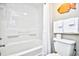 Clean bathroom with shower/tub combo, toilet and storage at 6804 N Ocean Blvd. # 627, Myrtle Beach, SC 29572
