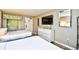 Bedroom with twin beds, dresser, and ocean view at 6804 N Ocean Blvd. # 627, Myrtle Beach, SC 29572