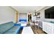 Open living space with sleeper sofa and dining area at 6804 N Ocean Blvd. # 627, Myrtle Beach, SC 29572