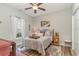 Bedroom featuring a comfortable bed, decorative rug, and stylish decor at 662 Sunnyside Dr. # 101, Murrells Inlet, SC 29576