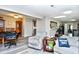 Comfortable living room with grey armchairs and view into kitchen and dining area at 872 Jackson Circle, Conway, SC 29526