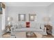 Living room with light colored sofa and shiplap walls at 4999 Highway 17 South # 304-D, Murrells Inlet, SC 29576