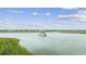 Boats on calm water near marsh grasses at 4999 Highway 17 South # 304-D, Murrells Inlet, SC 29576