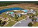 Aerial view of community amenities including pool, playground, and clubhouse at 7048 Watercress St, Myrtle Beach, SC 29579
