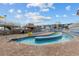 Outdoor lazy river pool with lounge chairs at 9550 Shore Dr. # 1202, Myrtle Beach, SC 29572