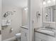Simple bathroom with granite countertop and white vanity at 9550 Shore Dr. # 1202, Myrtle Beach, SC 29572