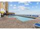 Refreshing outdoor pool with plenty of lounge chairs for sunbathing at 9550 Shore Dr. # 831, Myrtle Beach, SC 29572