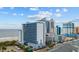 Aerial view of high rise building and beach at 2001 S Ocean Blvd. # 1005, Myrtle Beach, SC 29577