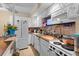 Modern kitchen with white cabinets and built-in microwave at 2001 S Ocean Blvd. # 1005, Myrtle Beach, SC 29577