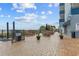 Oceanfront patio with tables and chairs for outdoor dining at 2001 S Ocean Blvd. # 1005, Myrtle Beach, SC 29577