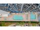 Overhead view of resort pools, hot tub, and lounge chairs at 2001 S Ocean Blvd. # 1005, Myrtle Beach, SC 29577