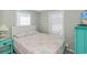 Bright bedroom with a comfy queen bed and coastal decor at 6001-1157 S Kings Hwy., Myrtle Beach, SC 29575