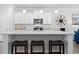 Island kitchen with white cabinets, quartz countertops, and stainless steel appliances at 1315 Bermuda Grass Dr., Myrtle Beach, SC 29579
