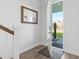 Bright entryway with tiled floors, open door, and a framed picture at 1315 Bermuda Grass Dr., Myrtle Beach, SC 29579