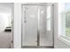 Large walk-in shower with marble tile and glass enclosure at 1315 Bermuda Grass Dr., Myrtle Beach, SC 29579