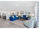 Open concept living room and kitchen area with modern furniture at 1315 Bermuda Grass Dr., Myrtle Beach, SC 29579