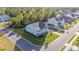 Aerial view of a charming two-story house in a residential neighborhood at 1315 Bermuda Grass Dr., Myrtle Beach, SC 29579