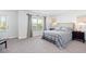 Bedroom with a queen bed and private balcony access at 1315 Bermuda Grass Dr., Myrtle Beach, SC 29579
