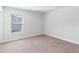 Empty bedroom with neutral walls and carpeting at 1315 Bermuda Grass Dr., Myrtle Beach, SC 29579