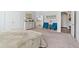 Spacious bedroom with ensuite bathroom access and sitting area at 1315 Bermuda Grass Dr., Myrtle Beach, SC 29579