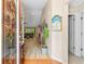 Bright and airy entryway with hardwood floors and view of living room at 544 Running Deer Trail, Myrtle Beach, SC 29588