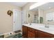 Double vanity bathroom with a shower/tub combo and a linen closet at 544 Running Deer Trail, Myrtle Beach, SC 29588
