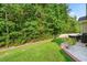 Landscaped backyard with privacy fence and grassy area at 544 Running Deer Trail, Myrtle Beach, SC 29588